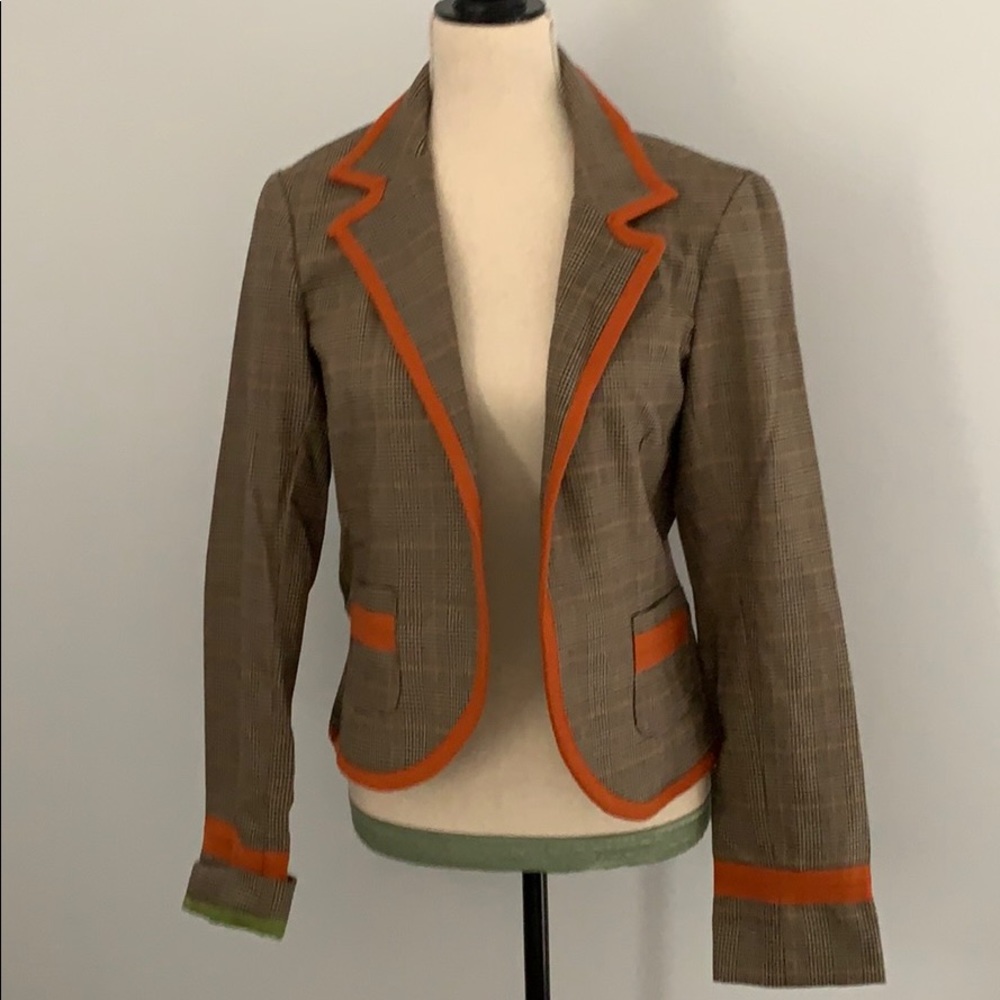 Cool blazer with fun details.